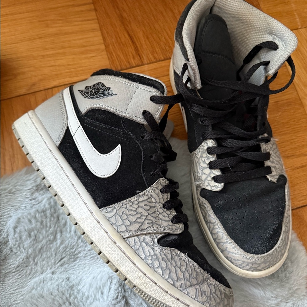 Men’s black, gray, speckled Air Jordan sneakers